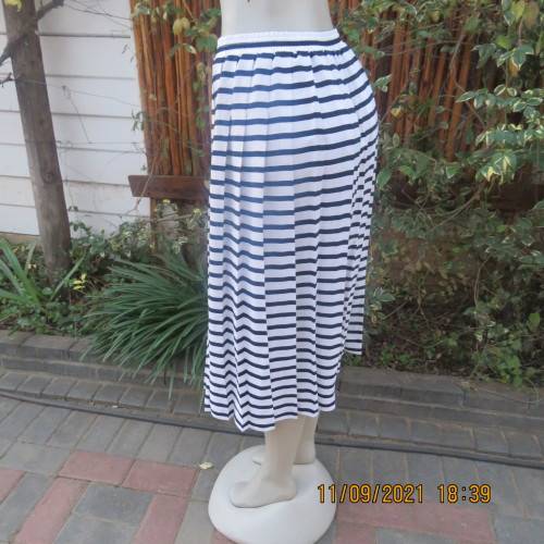 Make a statement in this white+navy horizontal striped skirt. By WOOLWORTHS in size 38/14. As new