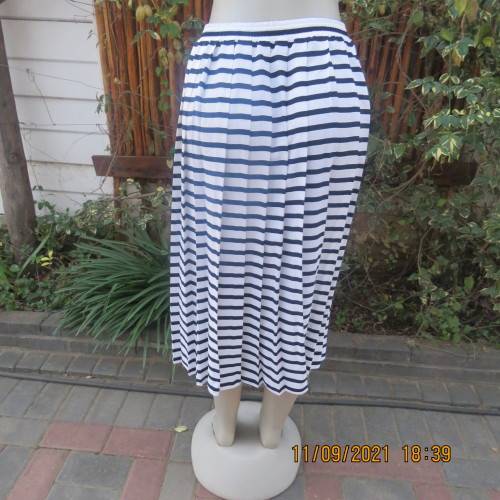 Make a statement in this white+navy horizontal striped skirt. By WOOLWORTHS in size 38/14. As new