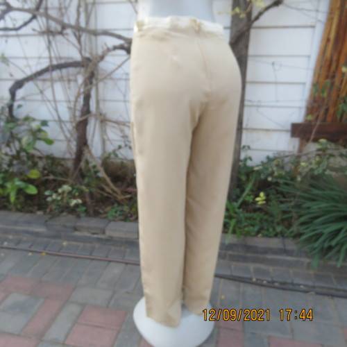 Glamour pants in gold colour polyester satin. By ASPIRE in size 34/10. Zip at back. Good condition.