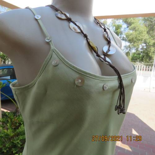 Go feminine in this apple green strappy fully lined dress.Size 36/12 by DEFINE.In linen/cotton blend
