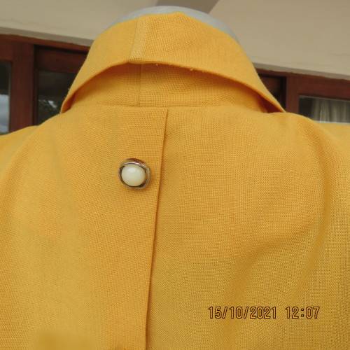 Fabulous mustard colour button down top by MERIEN HALL size 40/16.Sheer long sleeves.Buttons at back