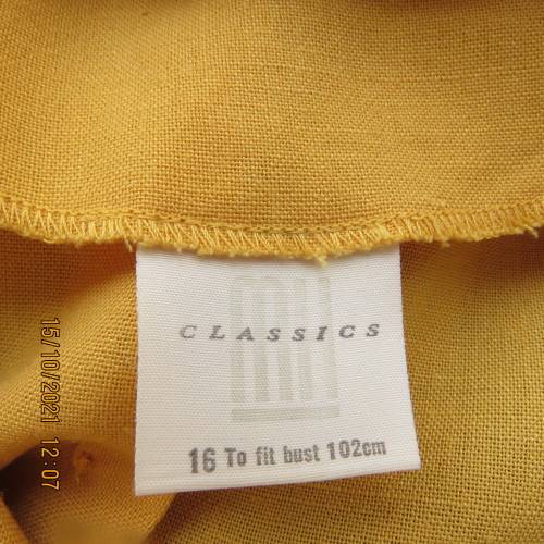 Fabulous mustard colour button down top by MERIEN HALL size 40/16.Sheer long sleeves.Buttons at back