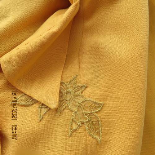 Fabulous mustard colour button down top by MERIEN HALL size 40/16.Sheer long sleeves.Buttons at back