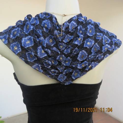 Youthful black velvet dropped waist dress. Acrylic lace,blue,gold skirt and shoulders.Size32 byOTT