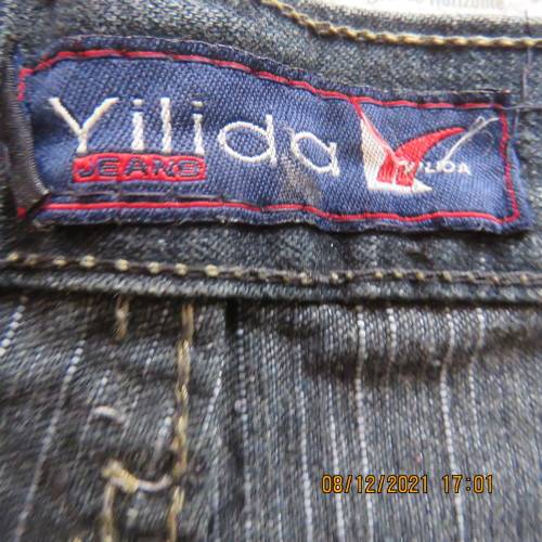 As new men`s straight leg cropped denim jeans size 34 by YILIDA. Washed out look.Logos.Pockets.