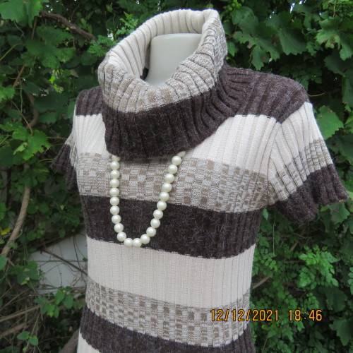 Knitted poloneck top in wide brown and cream horizontal lines. Acrylic yarn.Rib stich. Size 36 to 38