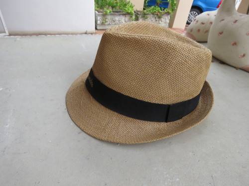 Men`s paper rattan fedora style hat size 58cm. Black band with SEDGWICK`S logo.New condition