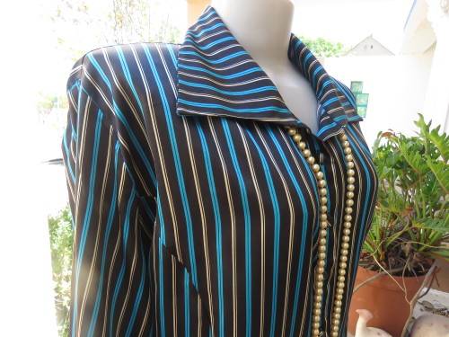 Fabulous long sleeve striped top in brown,cream and tuequoise.Size 48/24 by JUDY`S PRIDE.Button down