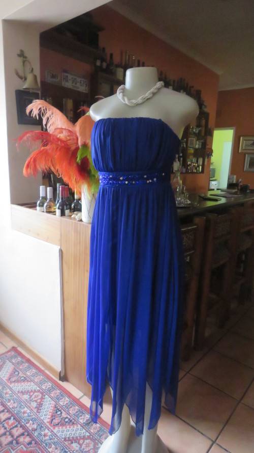 Hot strapless royal blue evening dress.Sheer overskirt.Ruched in top.Embellished.Size 32.Truworths.