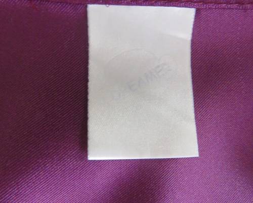 Sexy silky polyester fold over night gown in purple with side pockets.By DREAMER size 34 to 36.