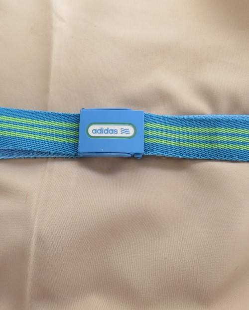 Genuine ADIDAS belt in polyester length 115cm. Size adjustable. In blue and yellow stripes. New cond