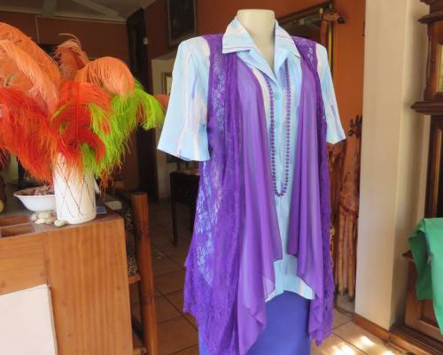 Girly purple acrylic lace gilet with netting front inlay. Frilled back seam.Size 36 to 38.As new