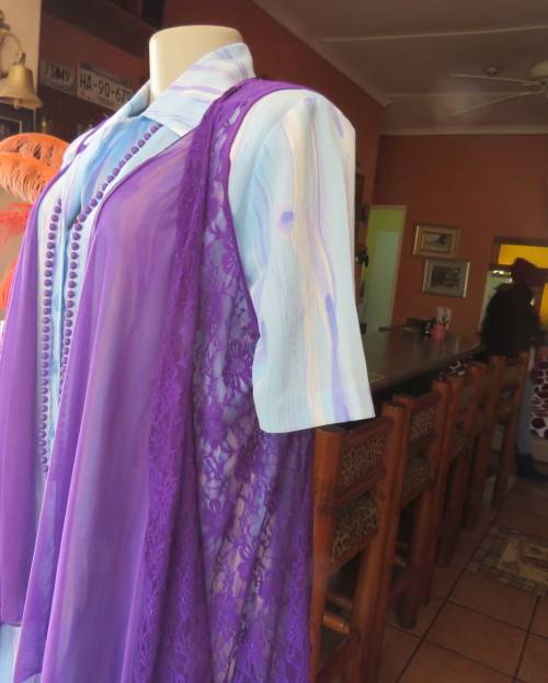 Girly purple acrylic lace gilet with netting front inlay. Frilled back seam.Size 36 to 38.As new