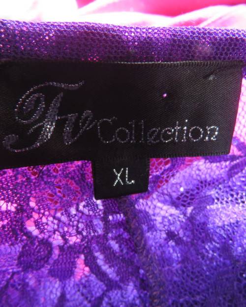Girly purple acrylic lace gilet with netting front inlay. Frilled back seam.Size 36 to 38.As new