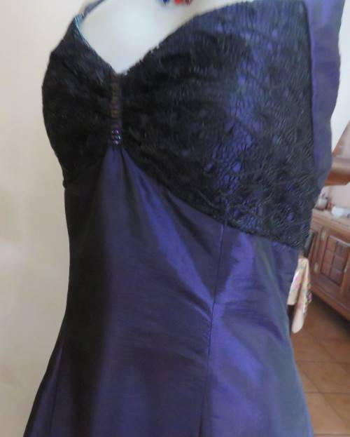 Sexy boutique made eggplant purple satin halter neck dress with black lace decor. Size 34/10.