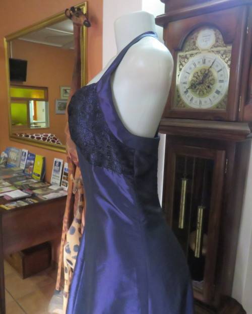 Sexy boutique made eggplant purple satin halter neck dress with black lace decor. Size 34/10.