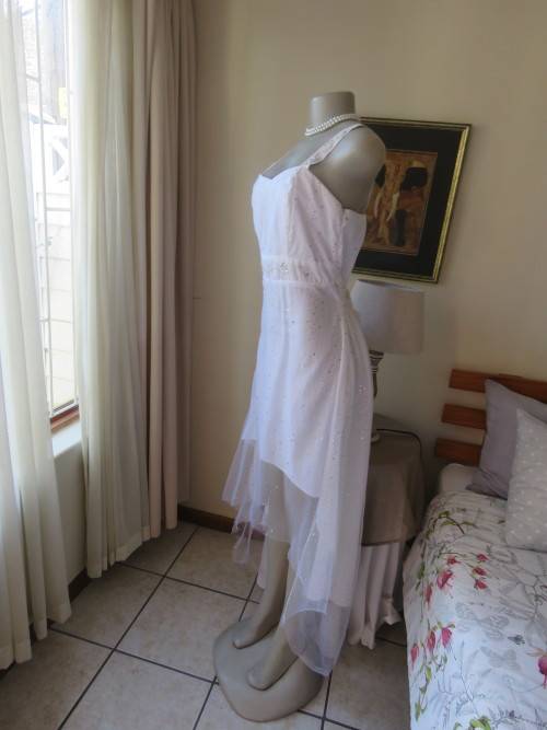 Pretty white strappy evening dress with glitter/embellishment.High/low seamline.Size 36 by GERANO