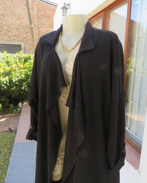 Stunning long black waterfall style loose hanging jacket.Spotless.As new.Bracelet sleeves.Size 42/18