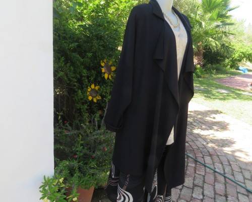 Stunning long black waterfall style loose hanging jacket.Spotless.As new.Bracelet sleeves.Size 42/18