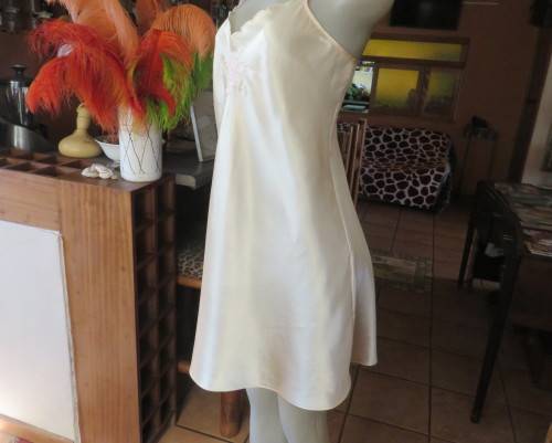 Vanilla colour silky satin polyester nighty with adjustable straps.By BODYLINE size 36 to 38.As new.