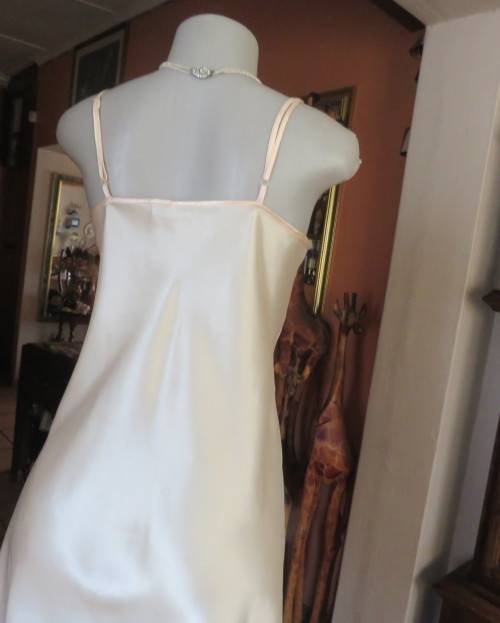 Vanilla colour silky satin polyester nighty with adjustable straps.By BODYLINE size 36 to 38.As new.
