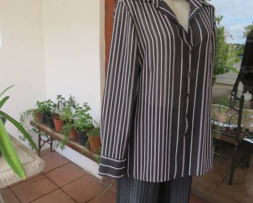Smart,versatile black/white striped long sleeve sheer polyester top by WOOLWORTHS size 40/16.As new.