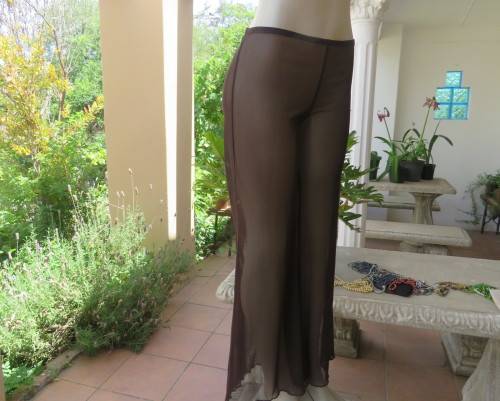 Brown stretch netting wide legg pants to wear under long tops.Size 36 to 38.By PIPPA`S in Vogue.New