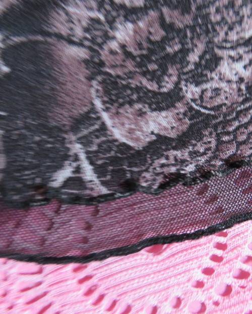 Stunning sheer black long sleeve top. Pale pink flowers on top layer.Size 34 by GOLD.Cord decoration