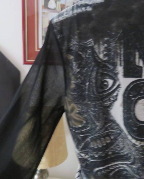 Stunning top by PERUZZI from Ireland. In black netting.2 layers.Top layer printed.Size 36/12.As new