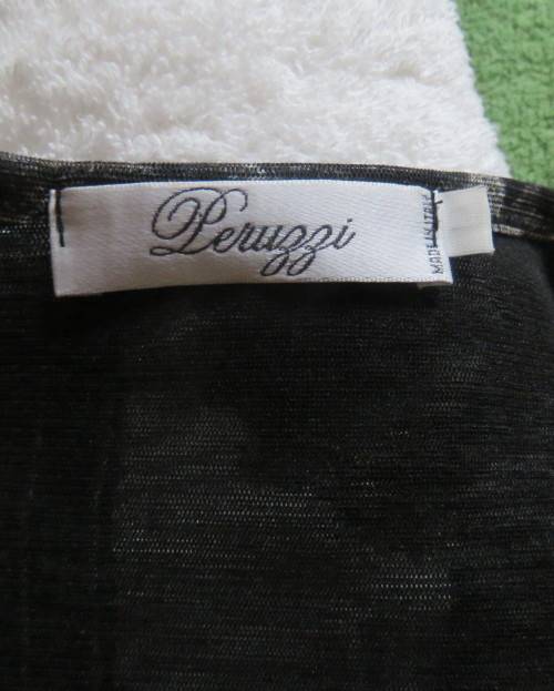 Stunning top by PERUZZI from Ireland. In black netting.2 layers.Top layer printed.Size 36/12.As new