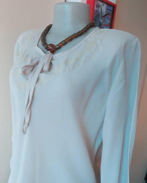 Beautiful wheat polyester slip over top Long angel sleeves.Scooped neckline with tiestring.Size 44