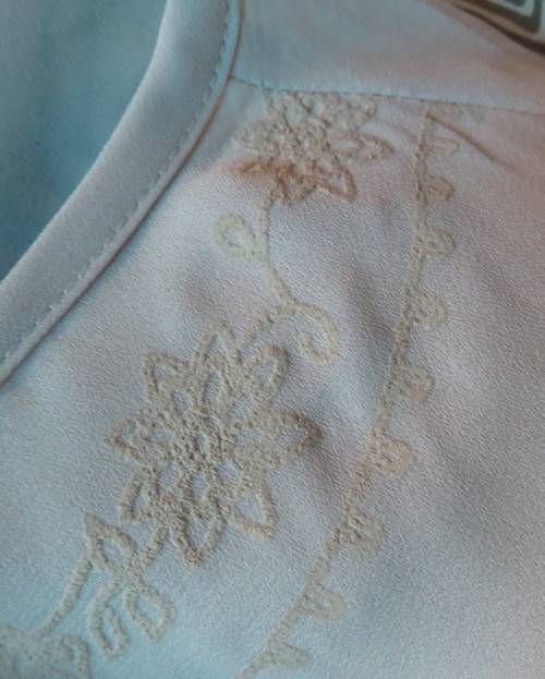 Beautiful wheat polyester slip over top Long angel sleeves.Scooped neckline with tiestring.Size 44