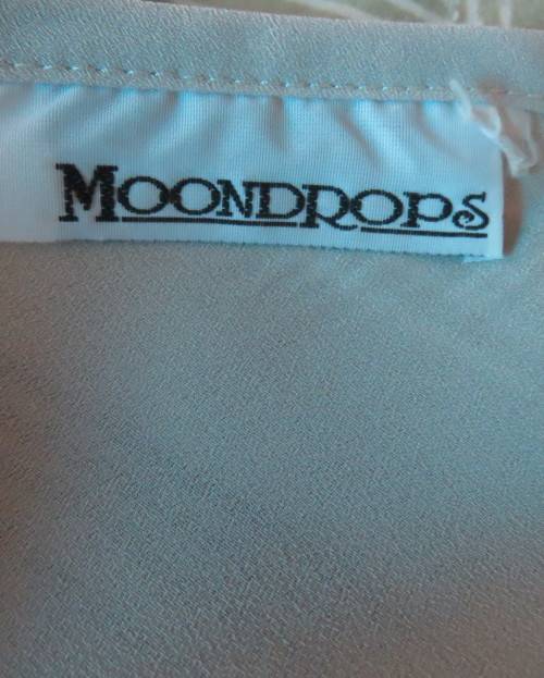 Beautiful wheat polyester slip over top Long angel sleeves.Scooped neckline with tiestring.Size 44