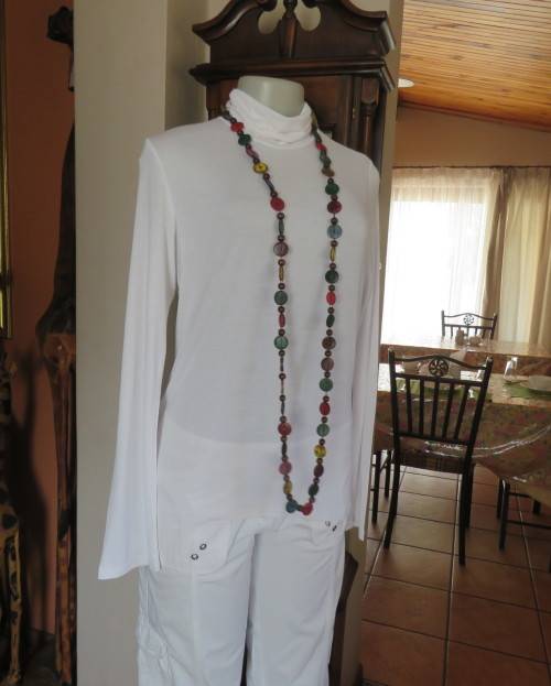 Handy white poloneck long sleeve top in stretch viscose by OR size 40/16.Perfect for under jacket.