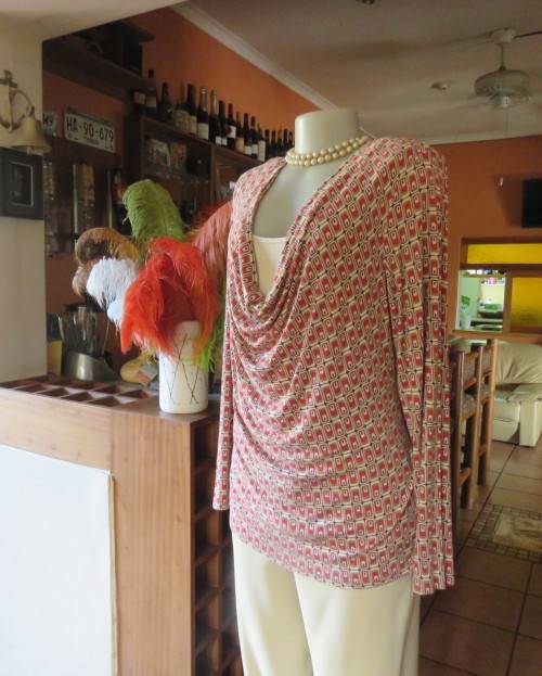 Smart soft long sleeve top in cream/brown/red block pattern.Cream underlay.Size 42/18.Cowl collar.