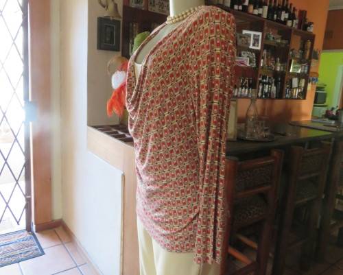 Smart soft long sleeve top in cream/brown/red block pattern.Cream underlay.Size 42/18.Cowl collar.