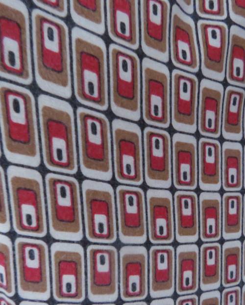 Smart soft long sleeve top in cream/brown/red block pattern.Cream underlay.Size 42/18.Cowl collar.