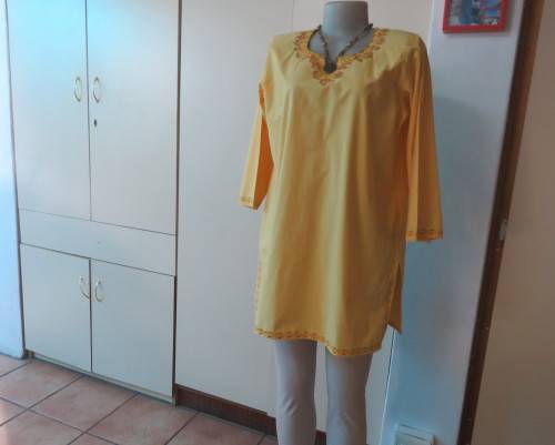 As new buttercup yellow richly embroidered top.Bracelet length sleeves.By BABA forn Kashmi.Size 40
