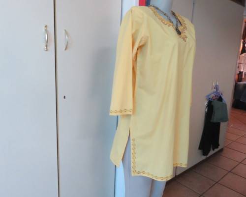 As new buttercup yellow richly embroidered top.Bracelet length sleeves.By BABA forn Kashmi.Size 40