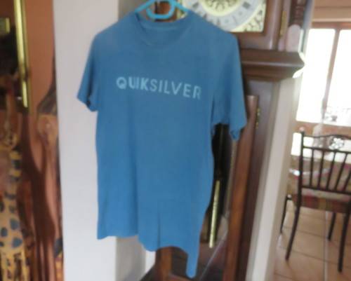 QUIKSILVER steel blue short sleeve T shirt for boy 13 to 14 yrs old. 100% cotton.Very good cond.