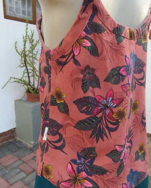 Sexy brick colour strappy top with floral patterns.Button down.Size 34 by RED.Never used.