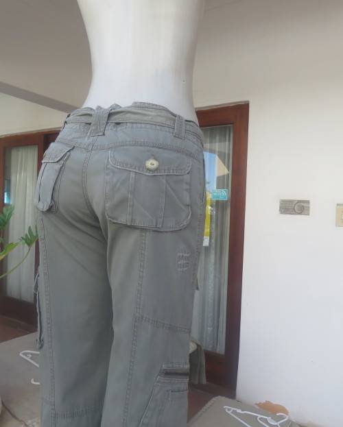 Vintage authentic 100% cotton. Wash out distressed look.Sage green.Pockets and stitching galore. 34.