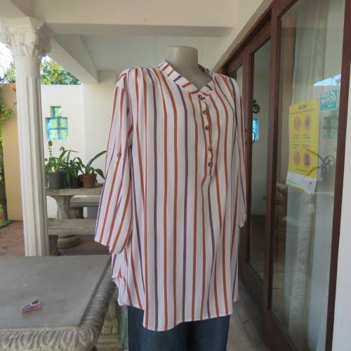 Cheeky poly/viscose long sleeve top. Blue/brick vertical stripes. High banded neck/opening.Size 46.