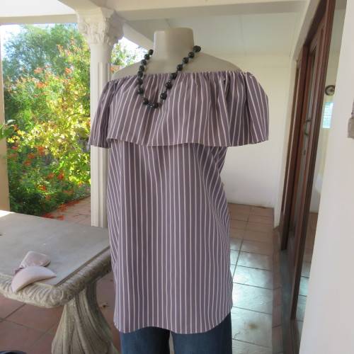 Lovely silver grey/white vertical striped top with wide elasticated frilled neckline.Size 38.As new