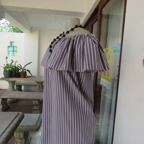 Lovely silver grey/white vertical striped top with wide elasticated frilled neckline.Size 38.As new