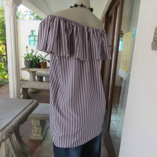 Lovely silver grey/white vertical striped top with wide elasticated frilled neckline.Size 38.As new