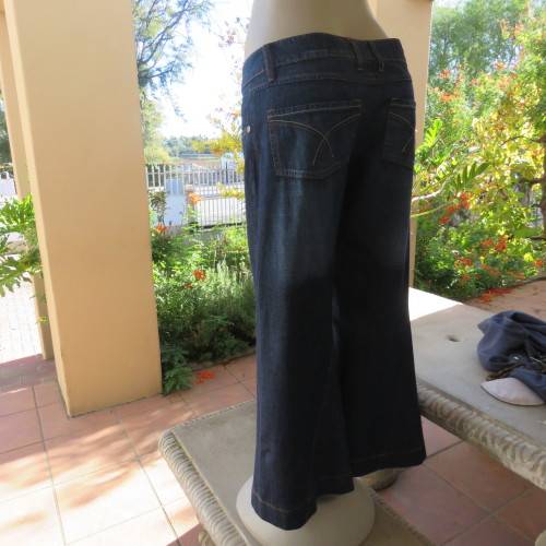 Low rise fashion blue denim jeans. Wide legged. 100% cotton.By RT size 36/12. New condition