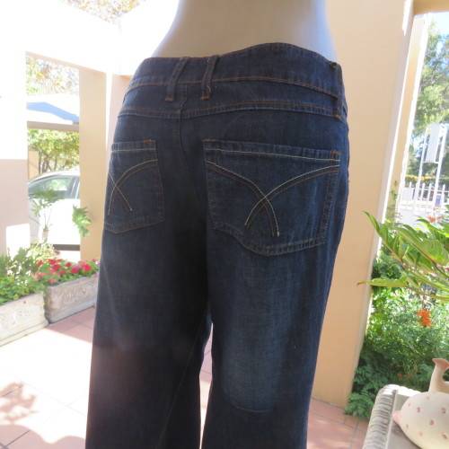 Low rise fashion blue denim jeans. Wide legged. 100% cotton.By RT size 36/12. New condition