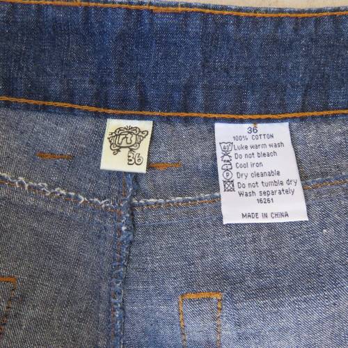 Low rise fashion blue denim jeans. Wide legged. 100% cotton.By RT size 36/12. New condition