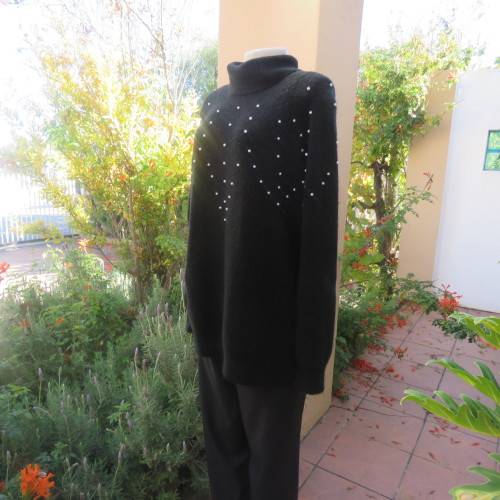 Fabulous black polyester/acrylic knitted poloneck pullover cardigan/pearl decorated.Size 44 by M H.